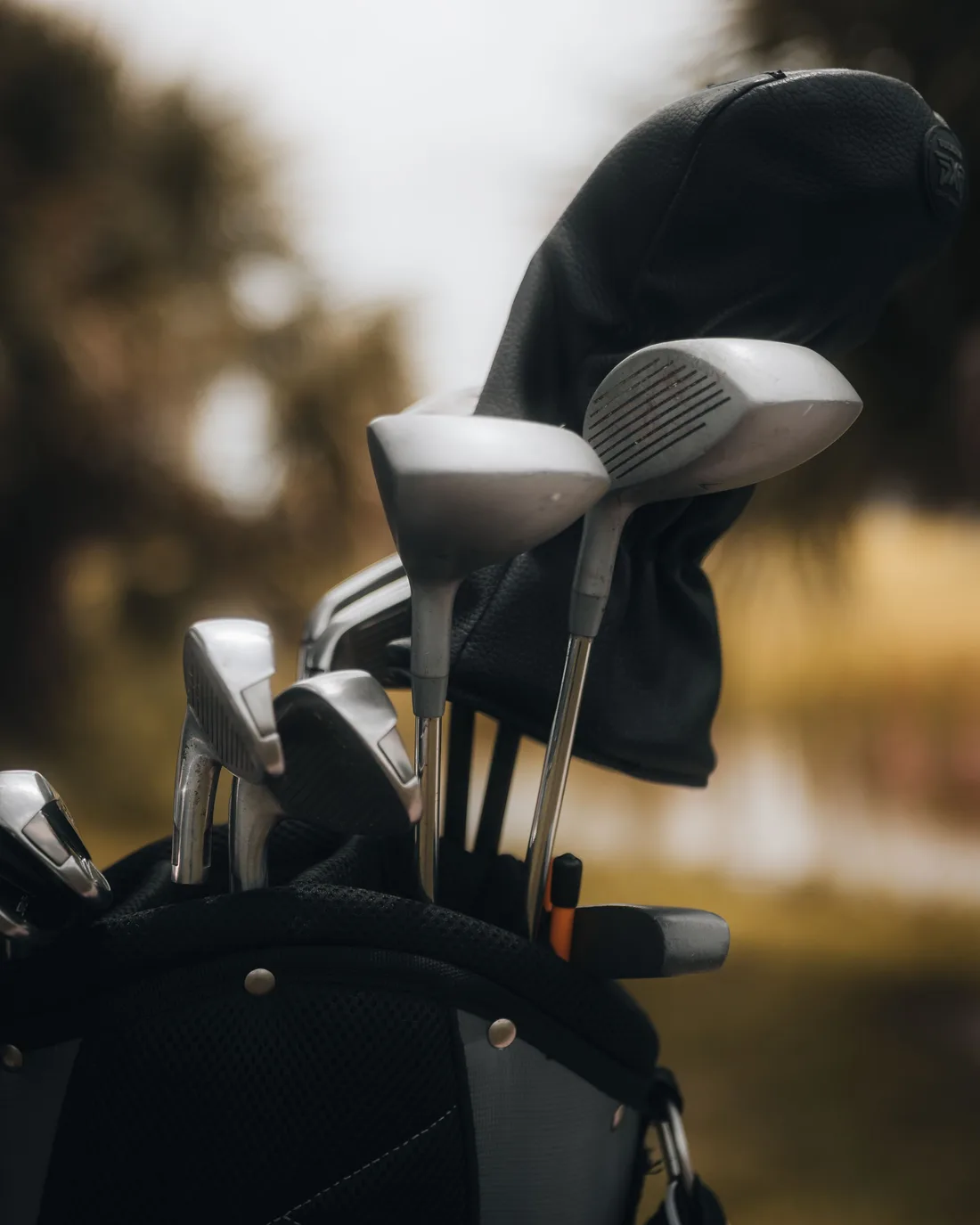 A golf bag filled with a full set of clubs